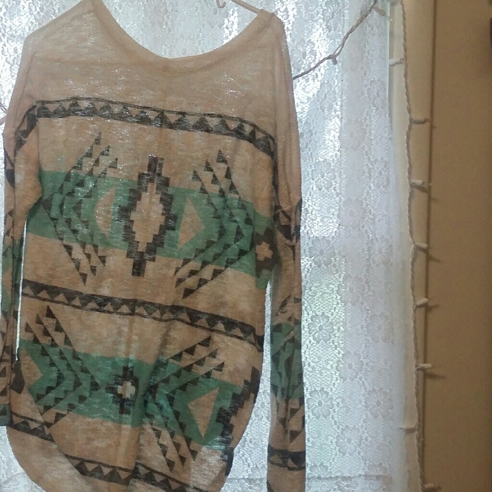 An oversized Luna Chic light sweater
